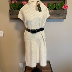 Cream sweater tunic purchased from Bohme.